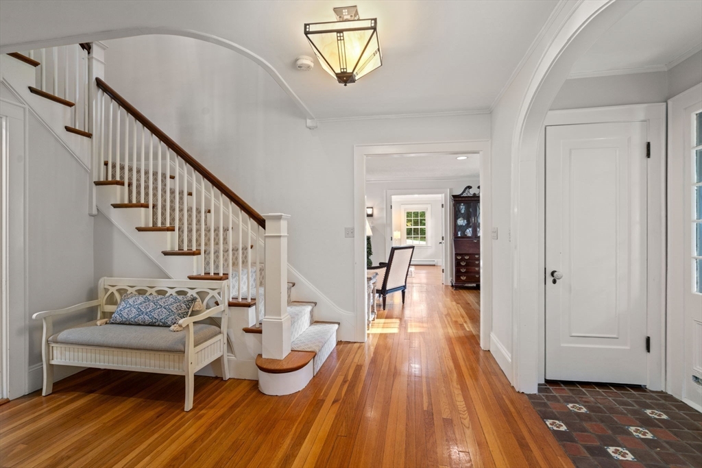 26 Larch Road Newton, MA 02468 - Photo 5 of 34 a view of entryway with wooden floor and stairs