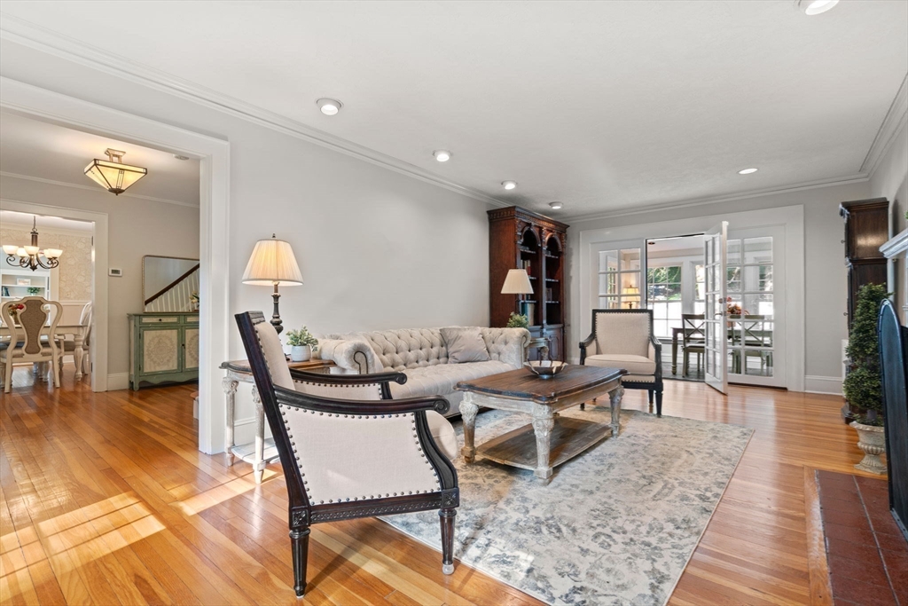 26 Larch Road Newton, MA 02468 - Photo 10 of 34 a dining room with furniture and wooden floor