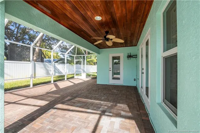 a view of swimming pool with seating space