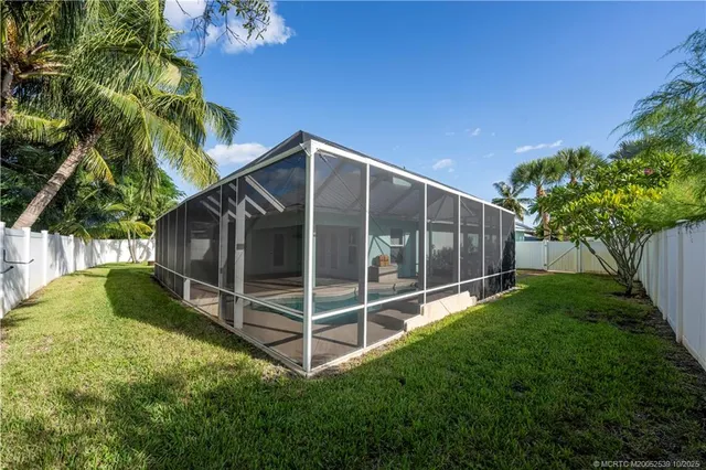 a view of room that has a bed and a window