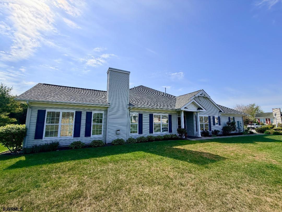 1731 Highway 9, Unit 11 Ocean View, NJ 08230 - Photo 17 of 25 a front view of a house with a garden and trees