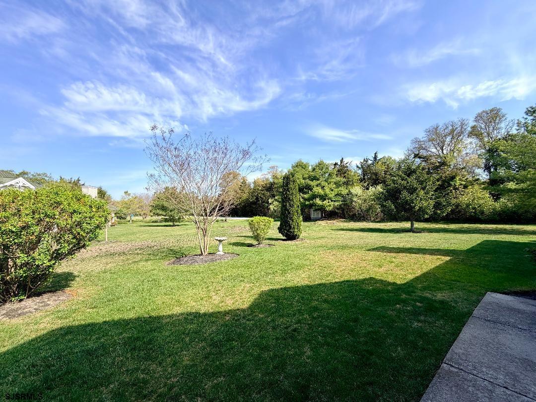 1731 Highway 9, Unit 11 Ocean View, NJ 08230 - Photo 18 of 25 a view of a golf course with a lake