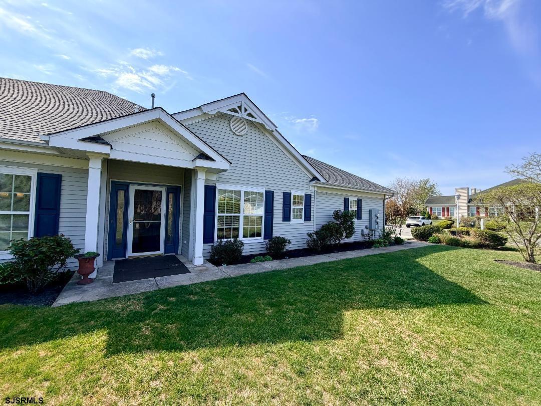 1731 Highway 9, Unit 11 Ocean View, NJ 08230 - Photo 19 of 25 a front view of a house with a garden and porch