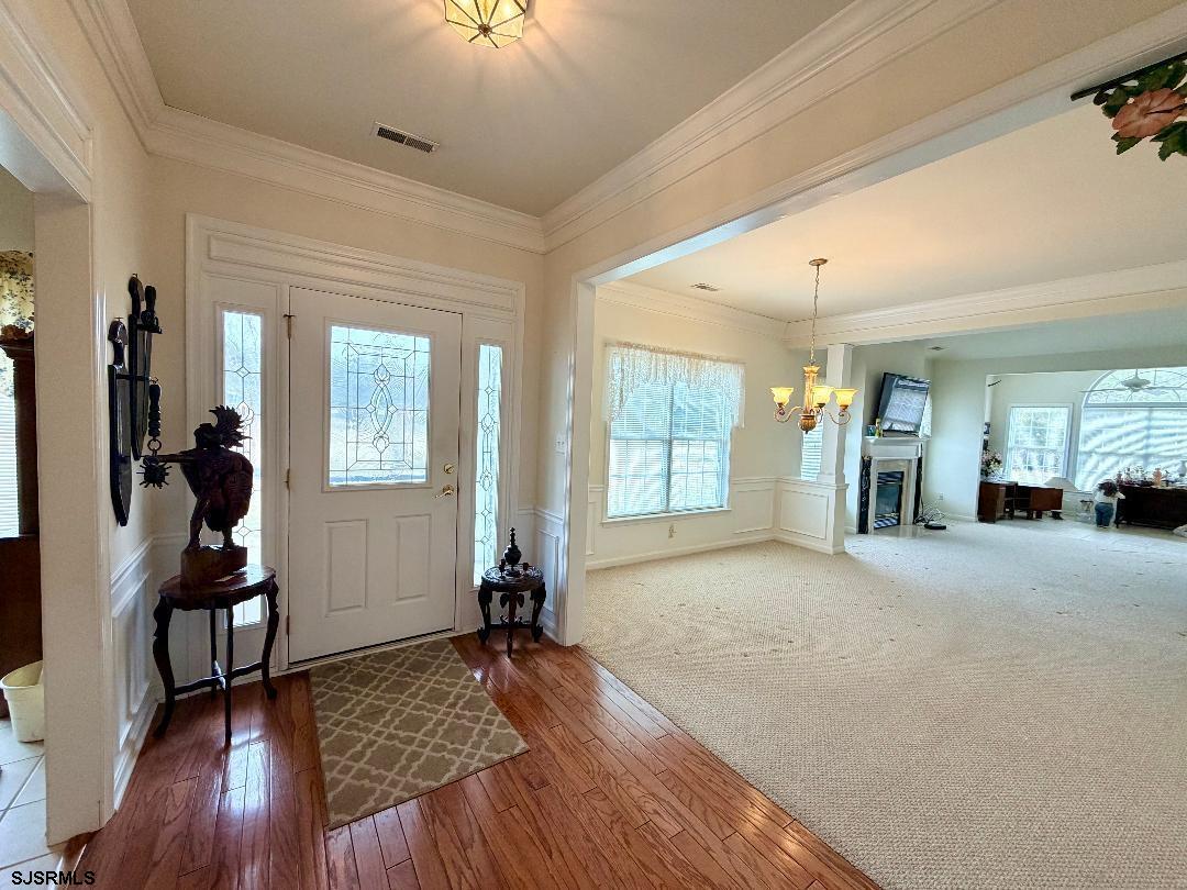 1731 Highway 9, Unit 11 Ocean View, NJ 08230 - Photo 2 of 25 wooden floor in an empty room with a window