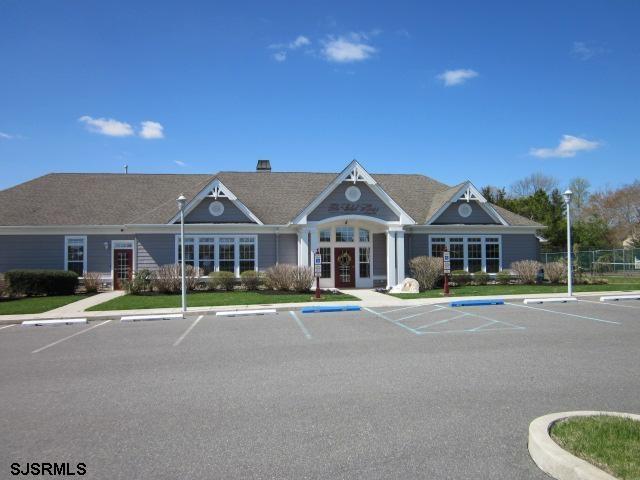 1731 Highway 9, Unit 11 Ocean View, NJ 08230 - Photo 21 of 25 a front view of a house with a yard
