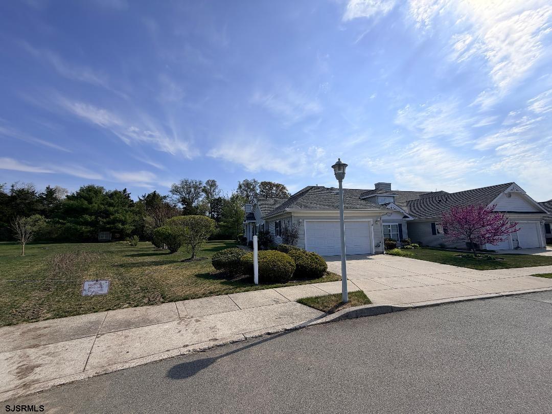 1731 Highway 9, Unit 11 Ocean View, NJ 08230 - Photo 24 of 25 a view of a street with a big yard