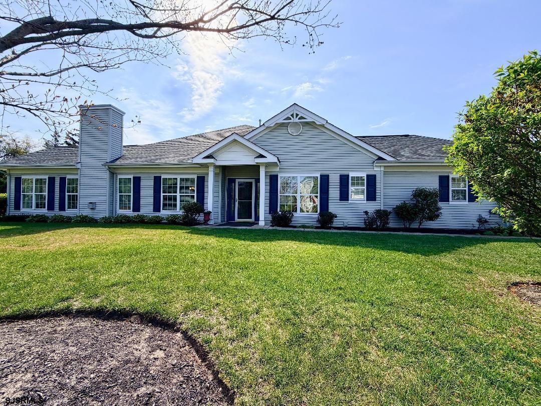 1731 Highway 9, Unit 11 Ocean View, NJ 08230 - Photo 25 of 25 a front view of a house with a garden and yard