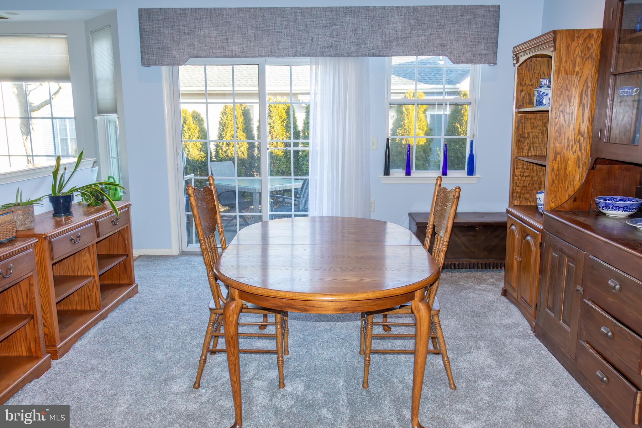 43 Chickadee Way Hamilton, NJ 08690 - Photo 16 of 36 a view of a dining room with furniture and a window