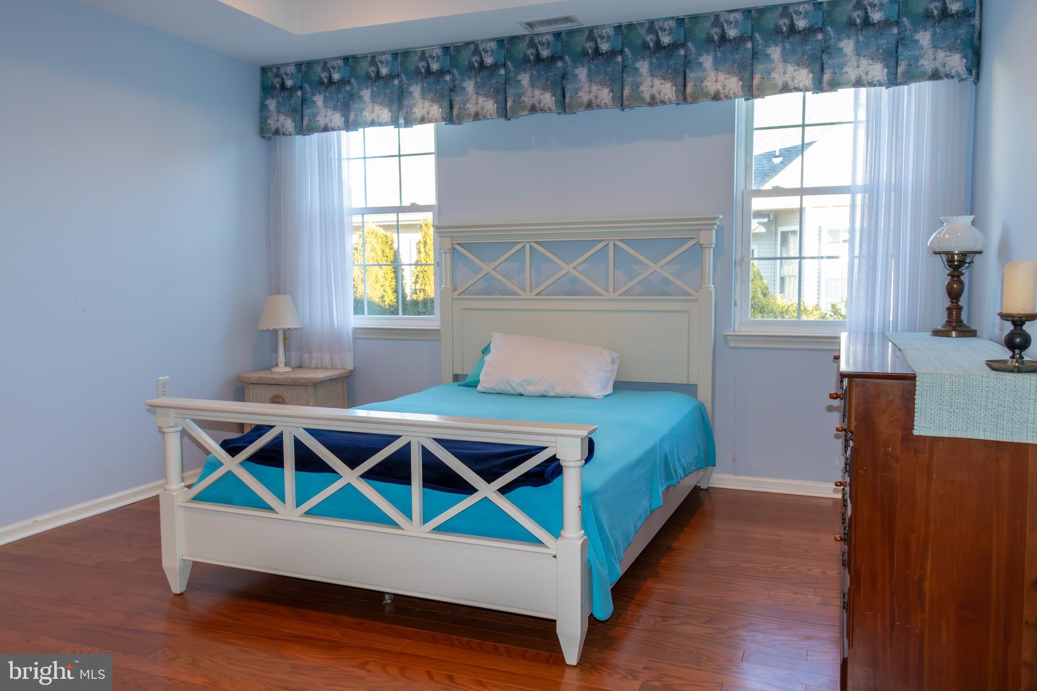 43 Chickadee Way Hamilton, NJ 08690 - Photo 19 of 36 a bed sitting in a bedroom next to a window