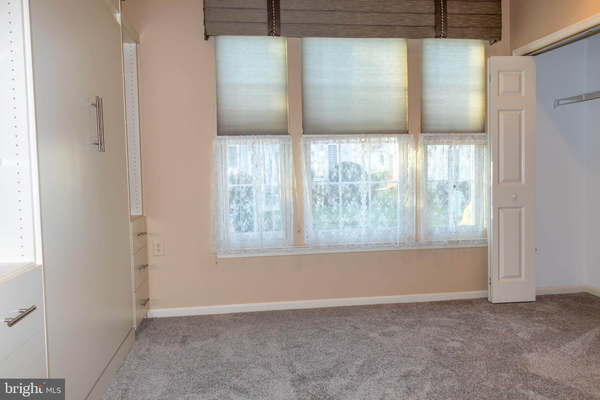 43 Chickadee Way Hamilton, NJ 08690 - Photo 27 of 36 a view of an empty room with a window