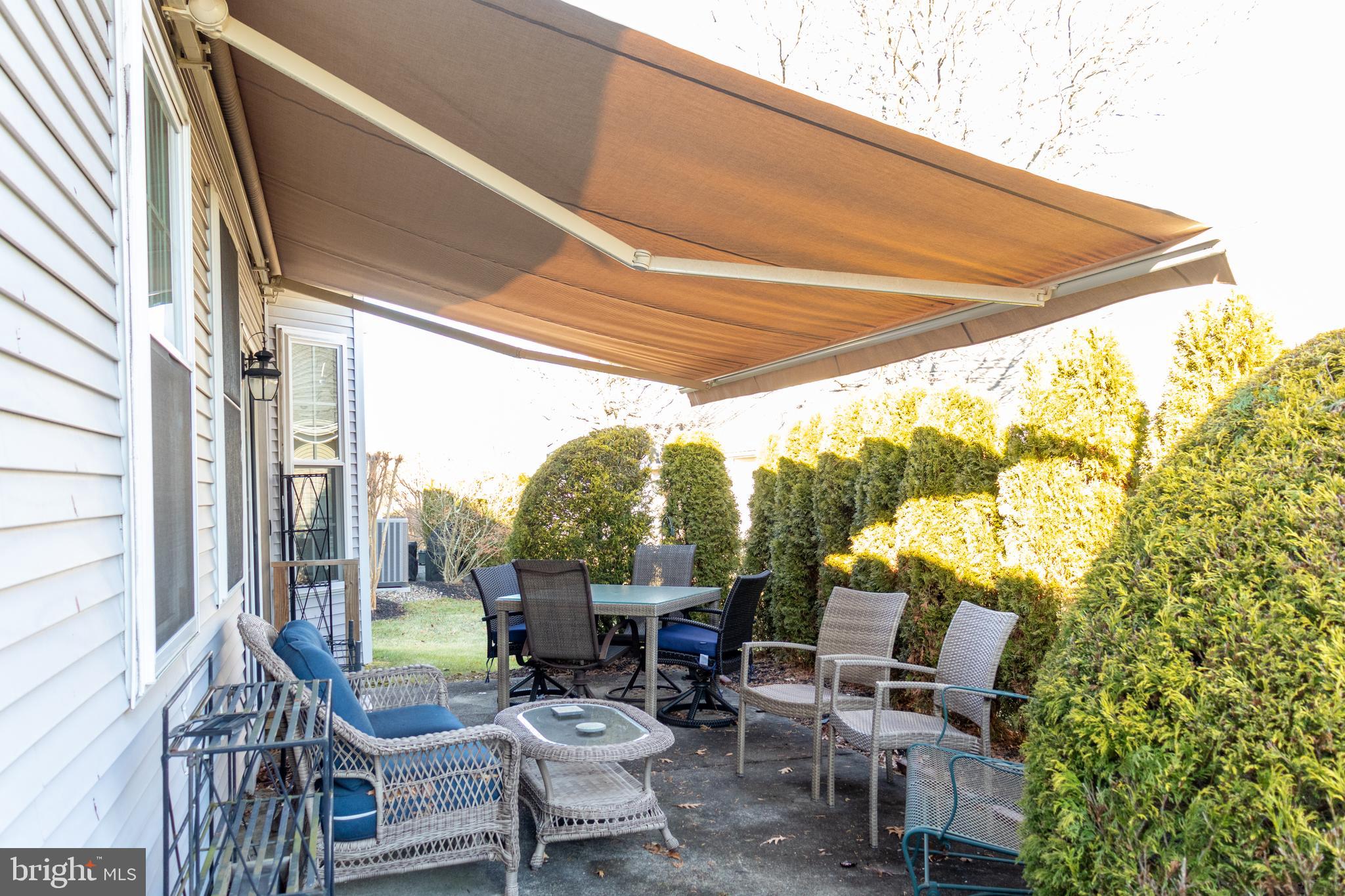 43 Chickadee Way Hamilton, NJ 08690 - Photo 33 of 36 a view of a patio with chairs and table in patio