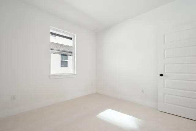 a front view of a house with garage