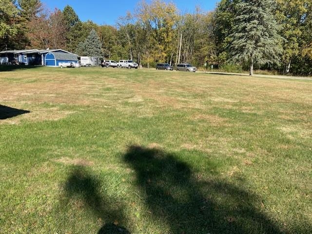 7 Clearwater Point Putnam, IL 61560 - Photo 20 of 21 a view of outdoor space with swimming pool and trees in the background