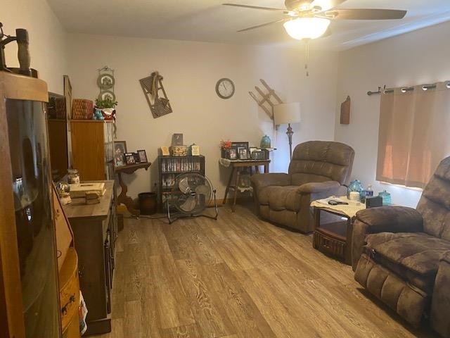 7 Clearwater Point Putnam, IL 61560 - Photo 5 of 21 a living room with couches chairs and closet with wooden floor