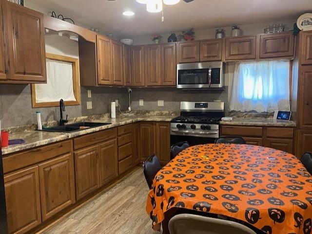 7 Clearwater Point Putnam, IL 61560 - Photo 8 of 21 a kitchen with stainless steel appliances granite countertop a sink and cabinets