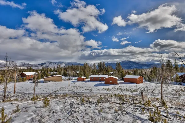 a view of a backyard of a house