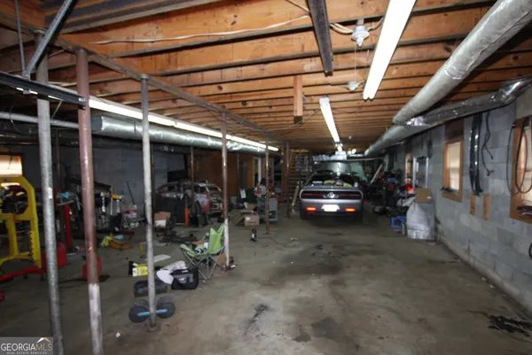 a view of a garage with chairs