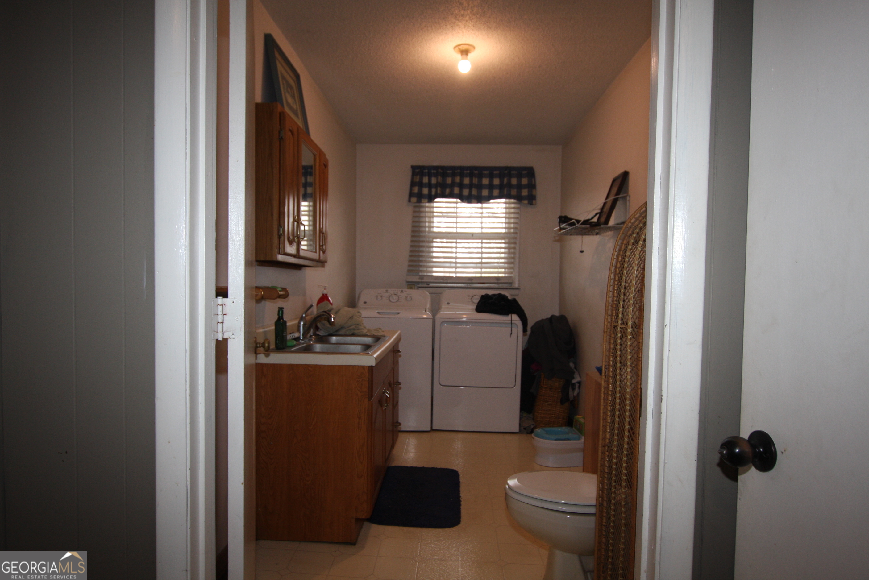 406 Old Rome Road Aragon, GA 30104 - Photo 10 of 21 a bathroom with a toilet and a sink