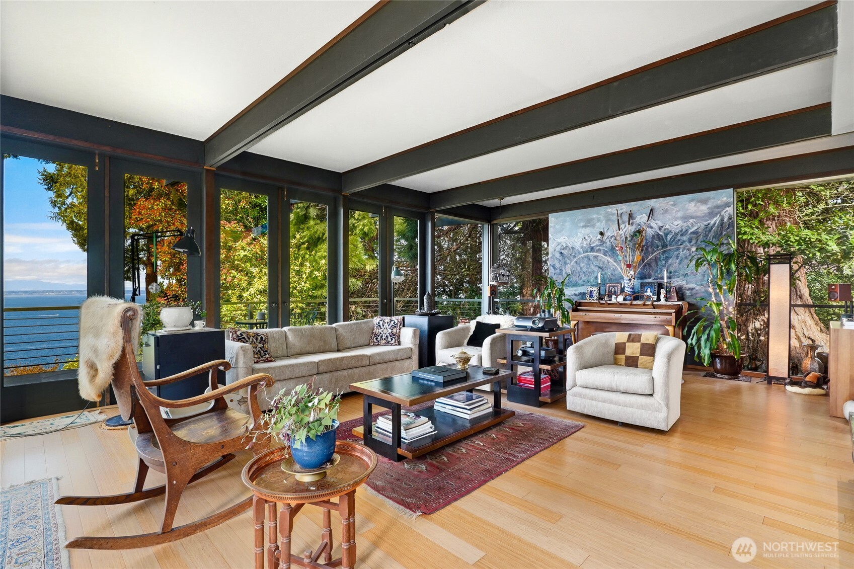 16202 72nd Avenue West Edmonds, WA 98026 - Photo 2 of 23 a living room with patio furniture and a floor to ceiling window
