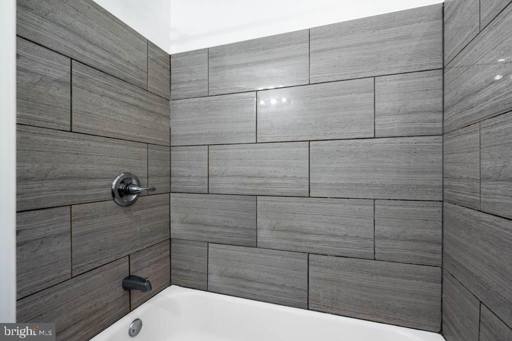 545 Christian Street, Unit 2 Philadelphia, PA 19147 - Photo 19 of 30 a bathroom with a shower