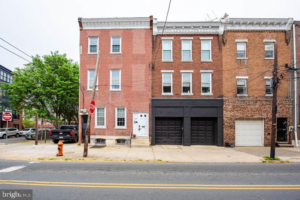 545 Christian Street, Unit 2 Philadelphia, PA 19147 - Photo 30 of 30 a front view of a building with street