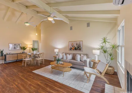 a living room with furniture and a table