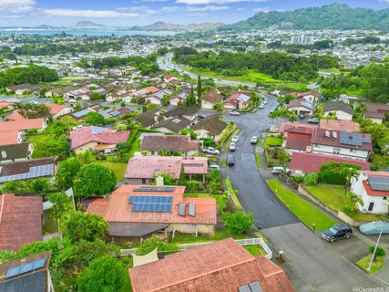 a view of a city with mountains in the background