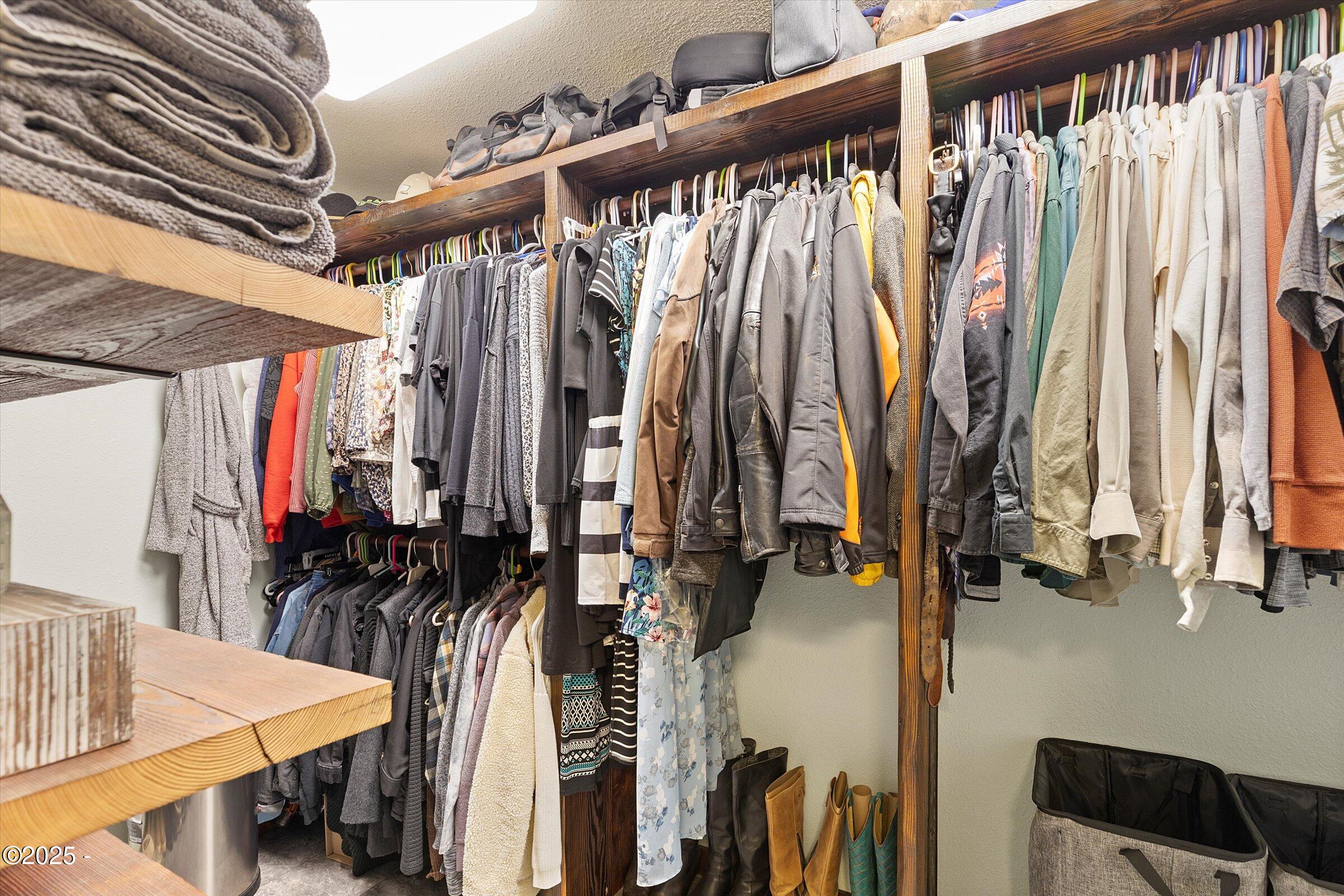 21560 Gooseneck Road Sheridan, OR 97378 - Photo 34 of 63 a view of walk in closet with clothes and shoes