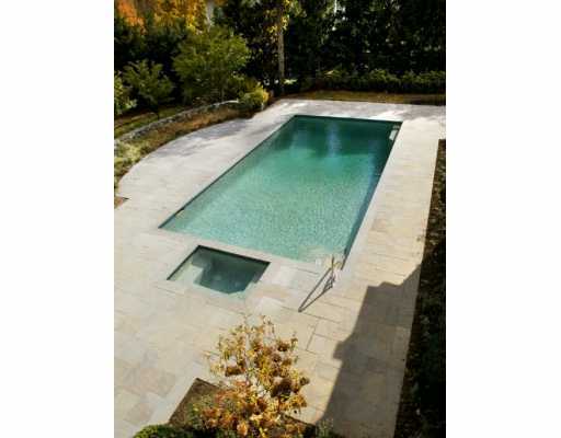 Undisclosed Address Greenwich, CT 06830 - Photo 5 of 7 a bathroom with a sink and mirror