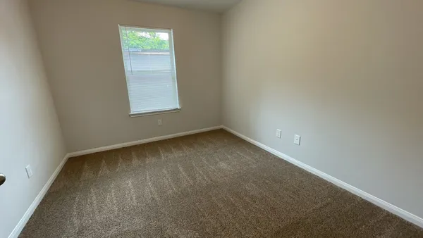 an empty room with a window