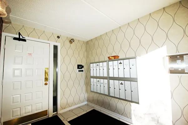 a view of a porch with wooden floor