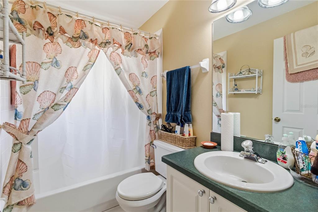 3225 Canoe Creek Road St. Cloud, FL 34772 - Photo 18 of 30 a bathroom with a sink toilet and shower