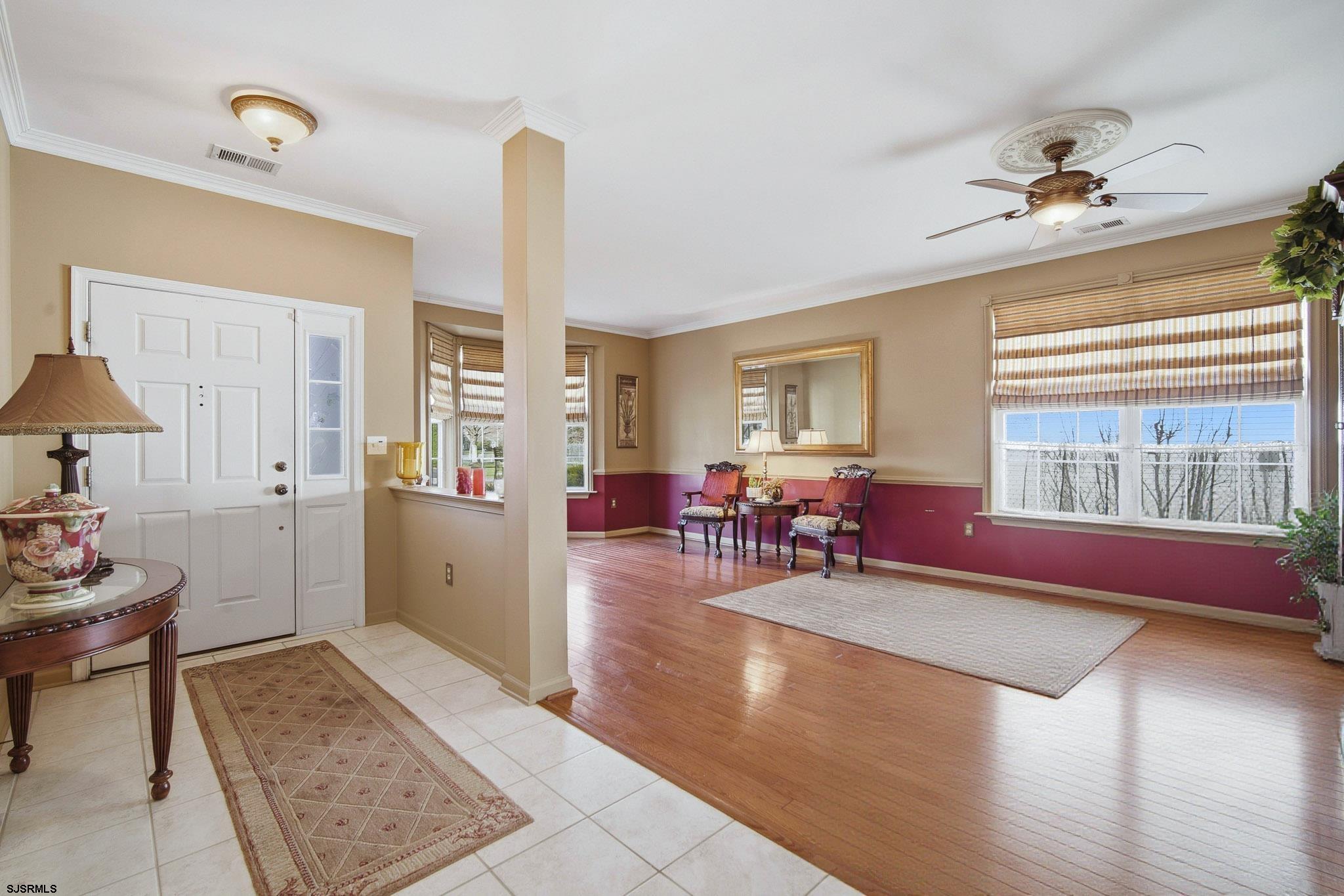 102 Warwick Road Galloway Township, NJ 08205 - Photo 6 of 45 a living room with furniture and wooden floor