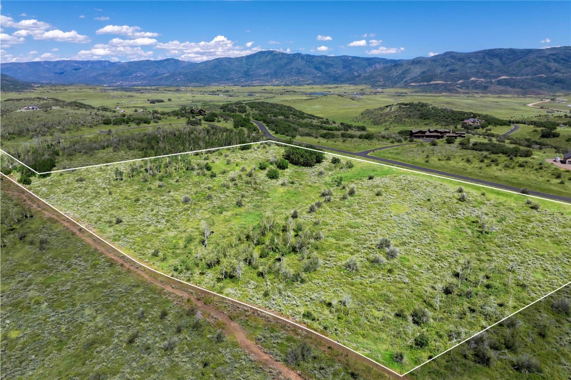 30575 Marshall Ridge Steamboat Springs, CO 80487 - Photo 3 of 18 a view of a lush green forest with mountains in the background