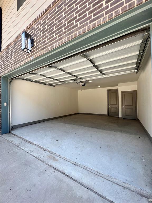 4020 McEwen Road, Unit 4106 Farmers Branch, TX 75244 - Photo 15 of 26 View of garage