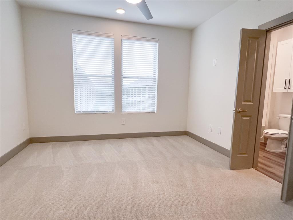 4020 McEwen Road, Unit 4106 Farmers Branch, TX 75244 - Photo 9 of 26 Spare room with light carpet and recessed lighting
