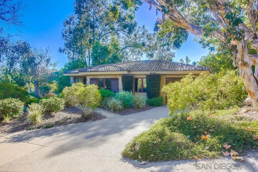 5653 Linea Del Cielo Rancho Santa Fe, CA 92067 - Photo 36 of 46 a view of a house with a yard