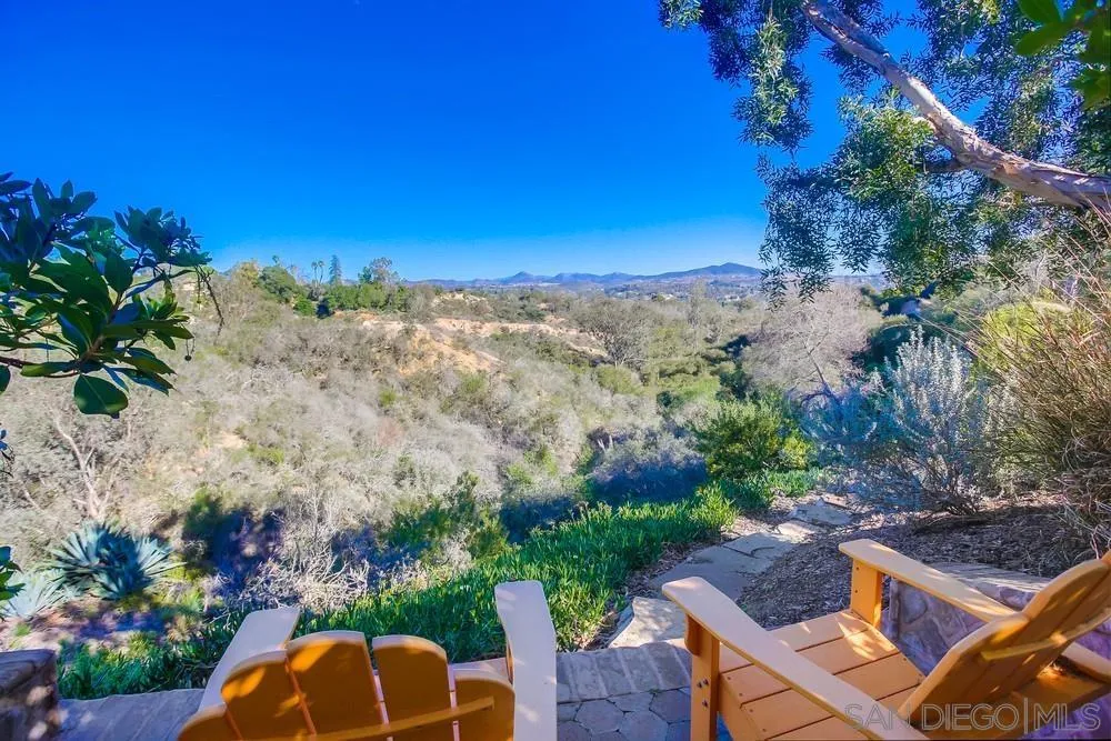 5653 Linea Del Cielo Rancho Santa Fe, CA 92067 - Photo 37 of 46 a view of a balcony with chair and table