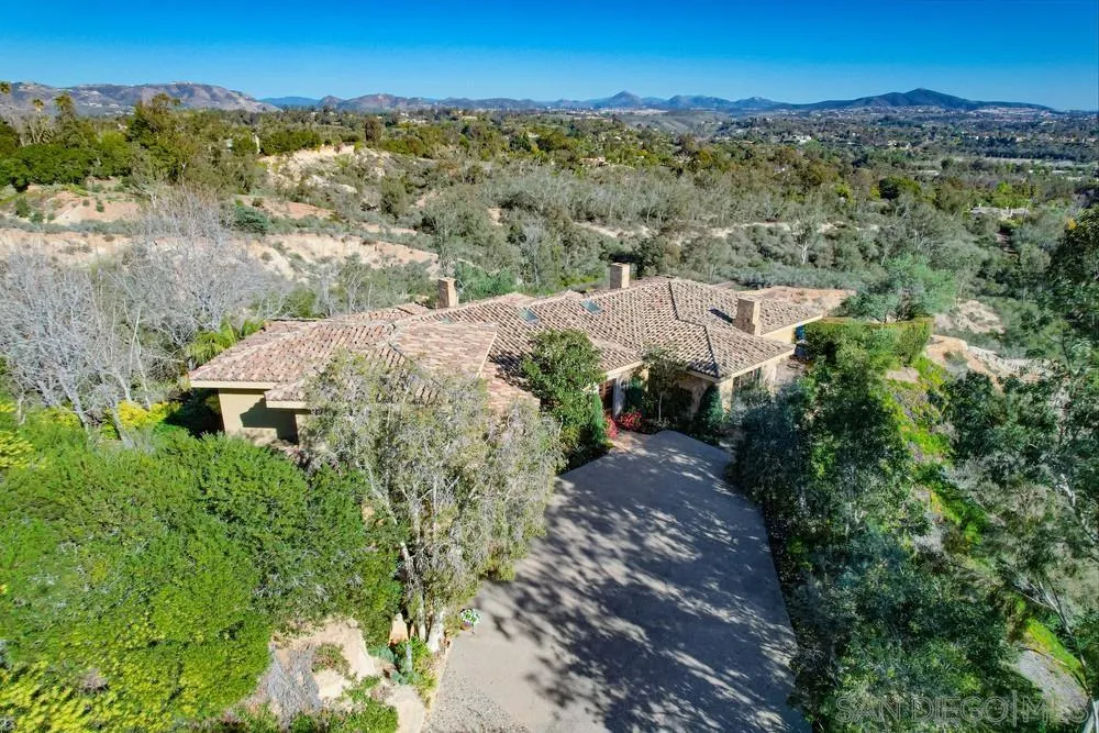 5653 Linea Del Cielo Rancho Santa Fe, CA 92067 - Photo 40 of 46 an aerial view of a house with mountain view