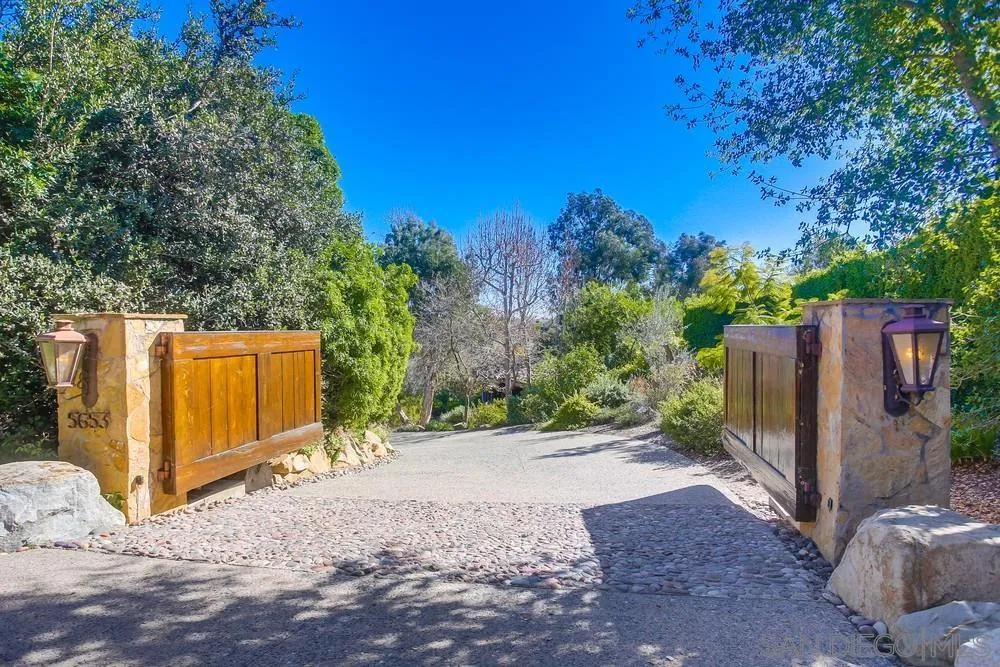 5653 Linea Del Cielo Rancho Santa Fe, CA 92067 - Photo 4 of 46 a view of a backyard with tree s