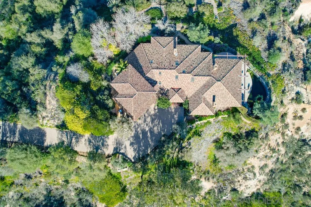 5653 Linea Del Cielo Rancho Santa Fe, CA 92067 - Photo 45 of 46 an aerial view of a house with a yard