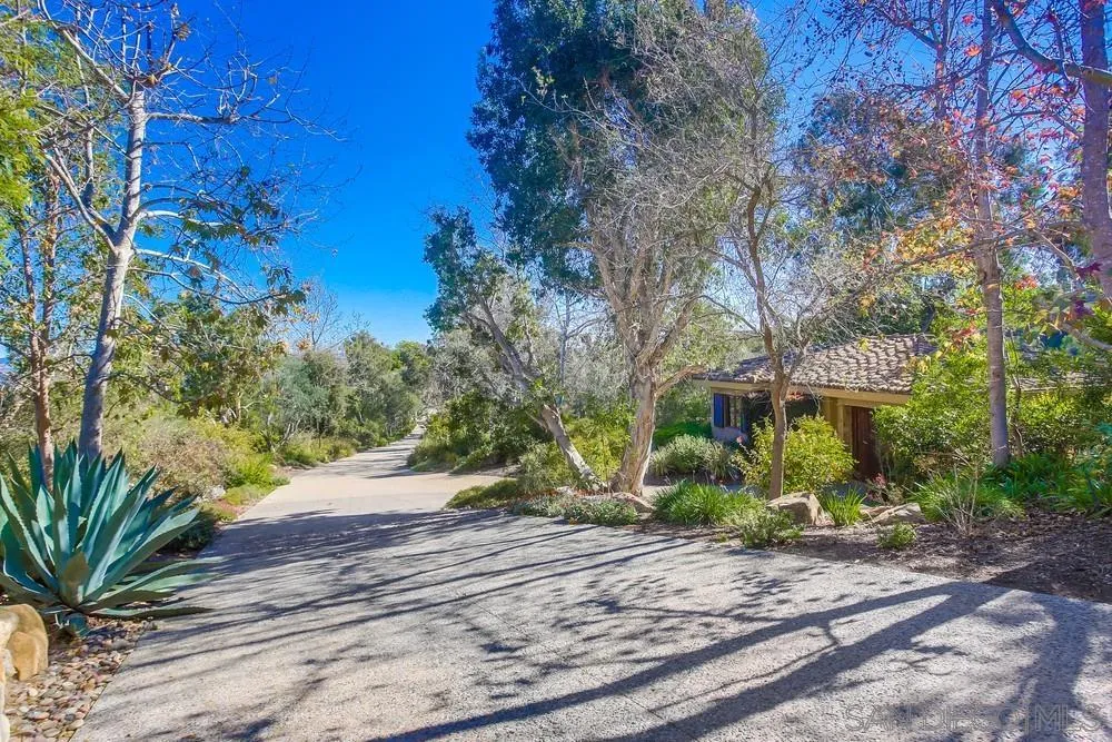 5653 Linea Del Cielo Rancho Santa Fe, CA 92067 - Photo 5 of 46 a view of a house with a street