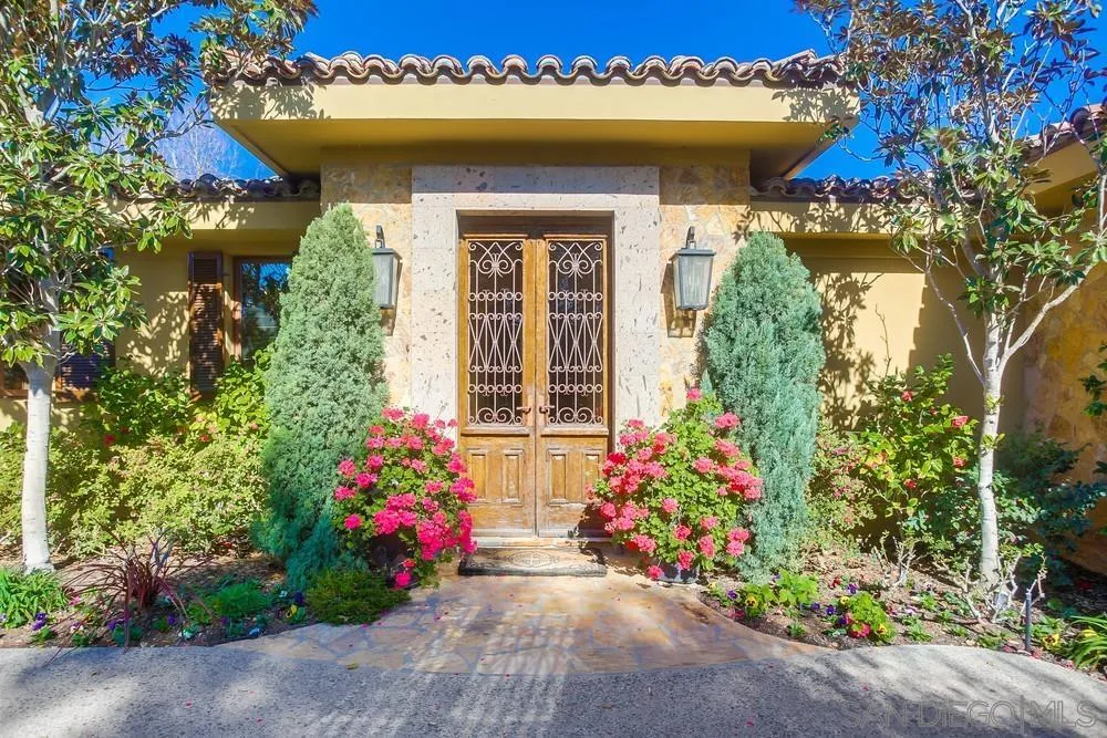 5653 Linea Del Cielo Rancho Santa Fe, CA 92067 - Photo 9 of 46 a view of a house with potted plants