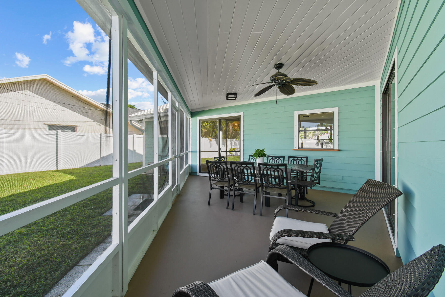 4153 Wingo Street Jupiter, FL 33469 - Photo 33 of 39 a view of a dining room with furniture window and outside view