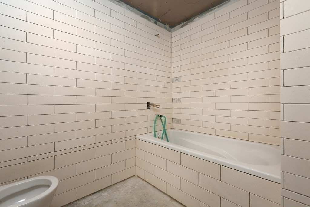 30 Monument Square, Unit 404 Boston, MA 02129 - Photo 10 of 14 a bathroom with a shower