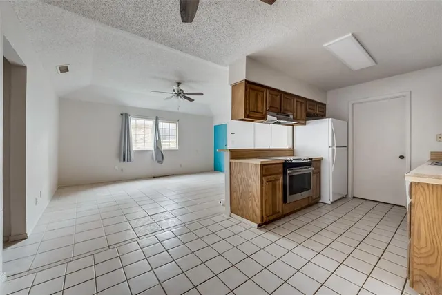 a front view of house with yard and seating area