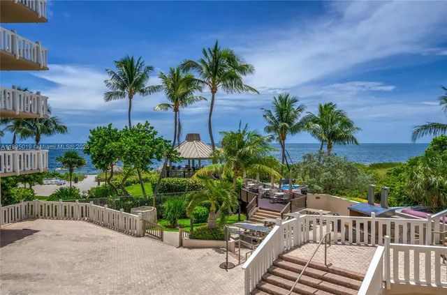 a view of a backyard with a patio