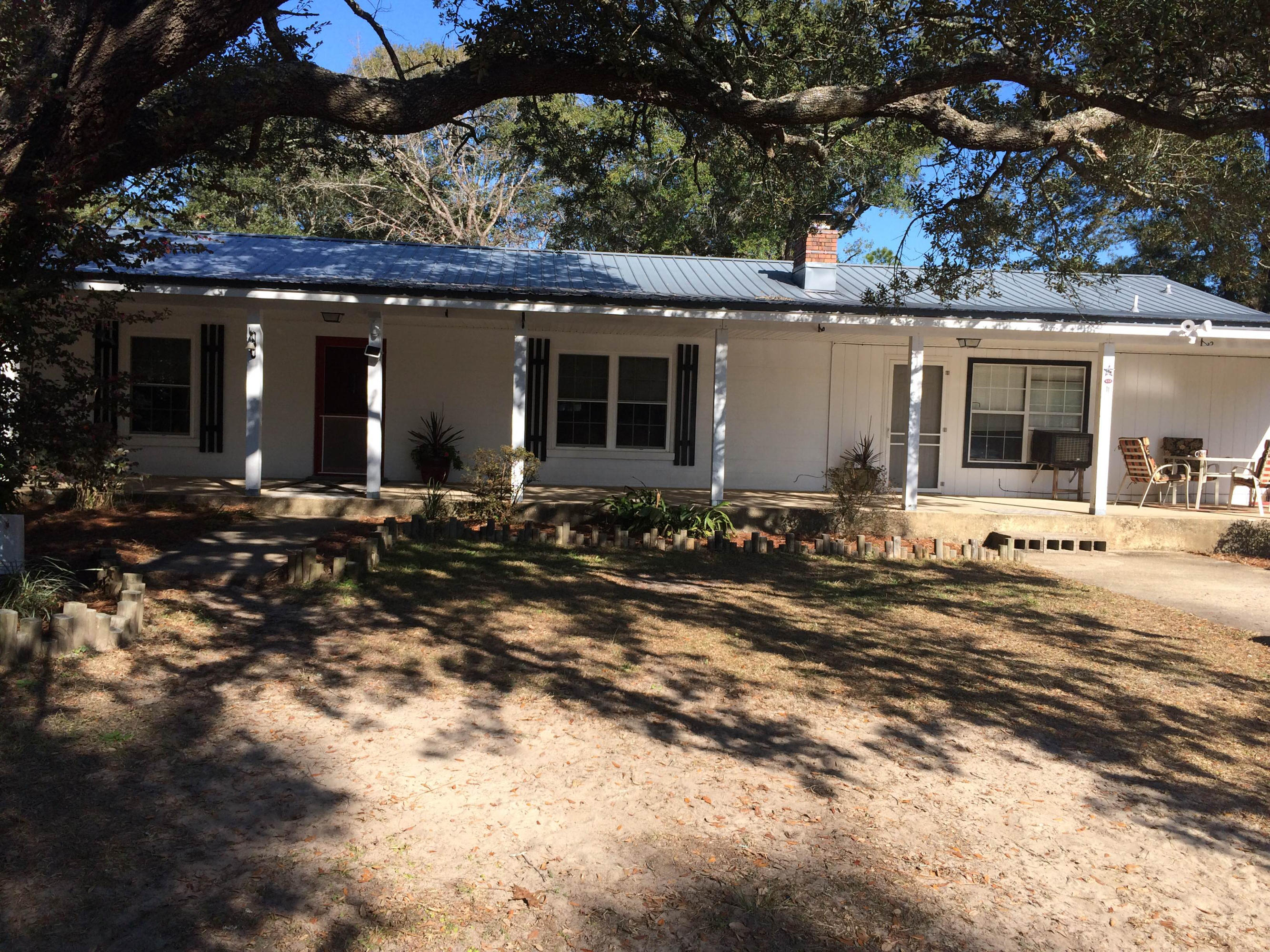 a front view of a house with a patio