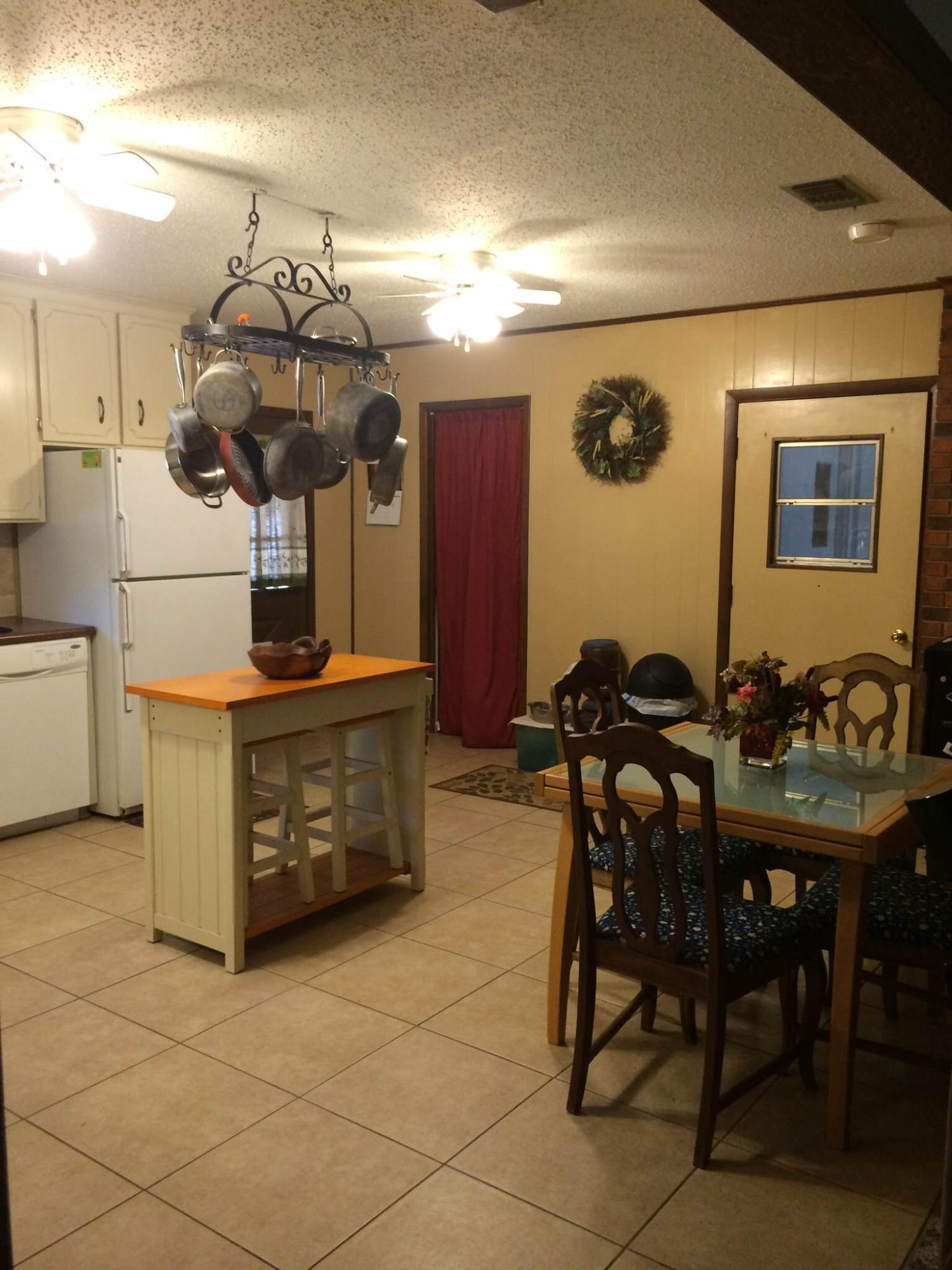 5555 Buck Ward Road Baker, FL 32531 - Photo 18 of 68 a view of a dining room with furniture