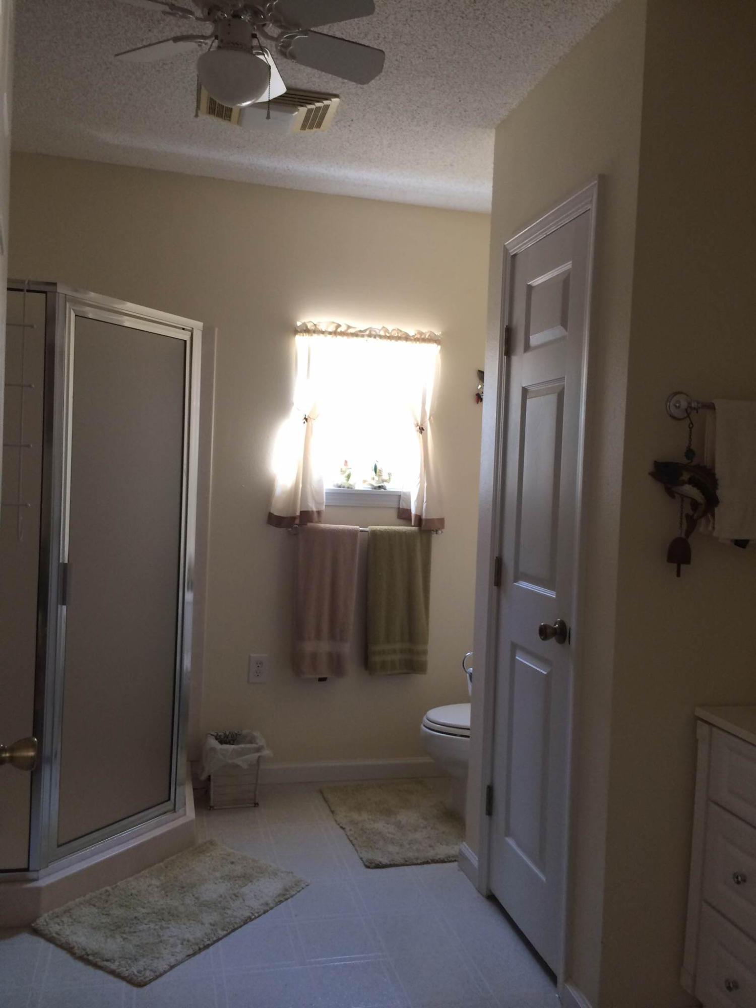 5555 Buck Ward Road Baker, FL 32531 - Photo 35 of 68 an empty room with a bathroom and a mirror
